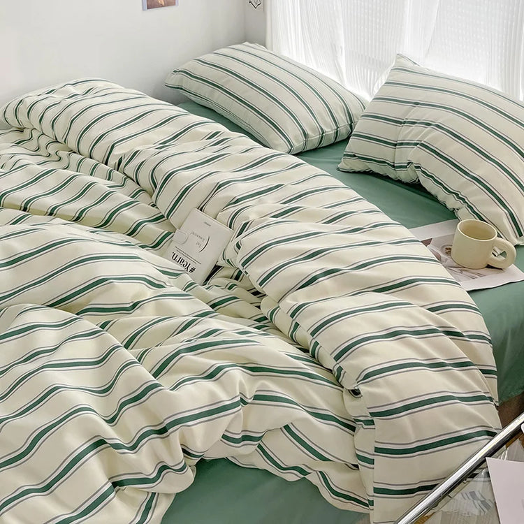 Simple Red and Blue Striped Duvet Cover and Four Piece Bed Sheet Set with Washed Cotton Bedding on the Bed